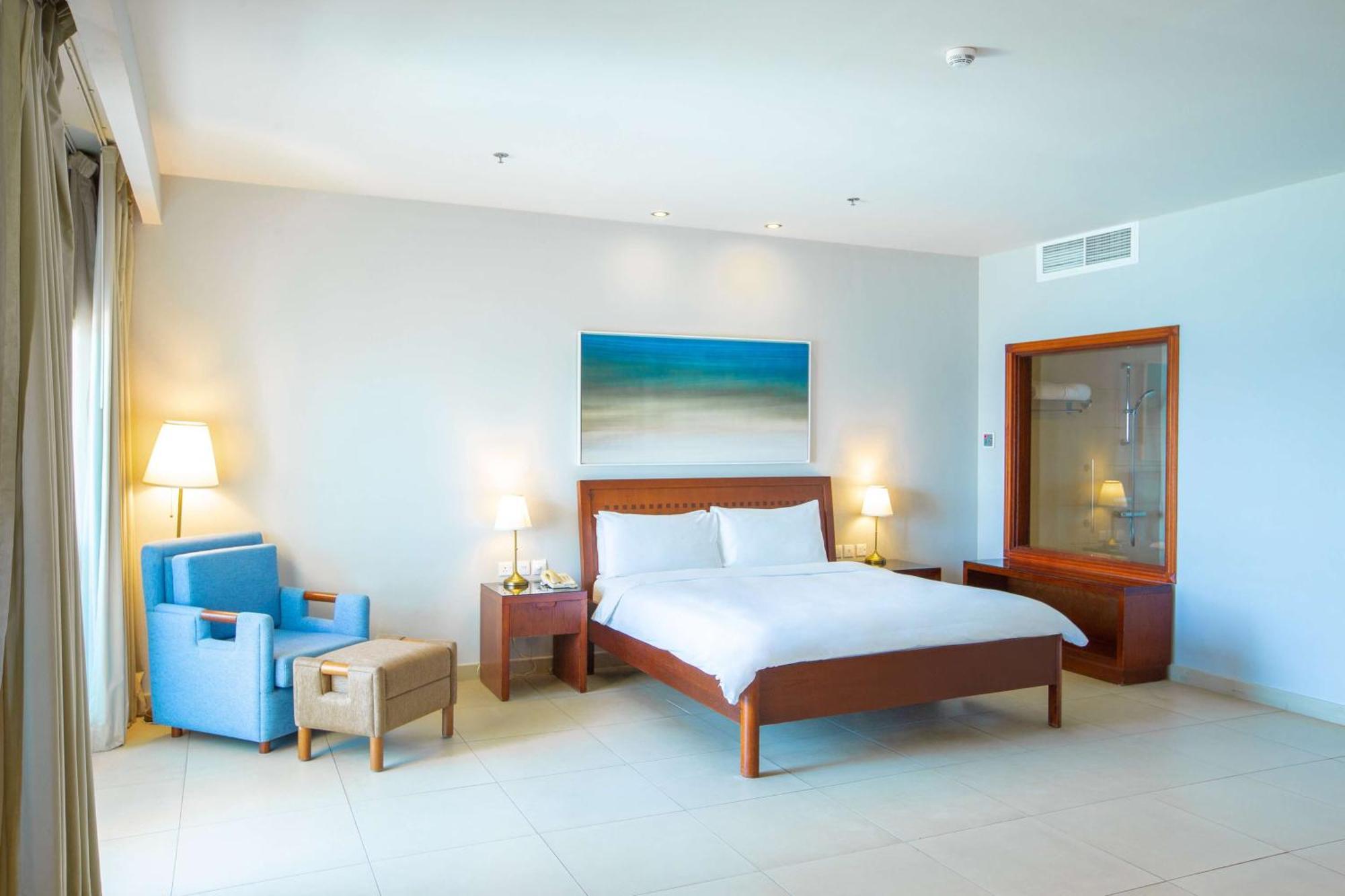 منتجع راديسون بلو، الفجيرة المظهر الخارجي الصورة A bedroom at the resort